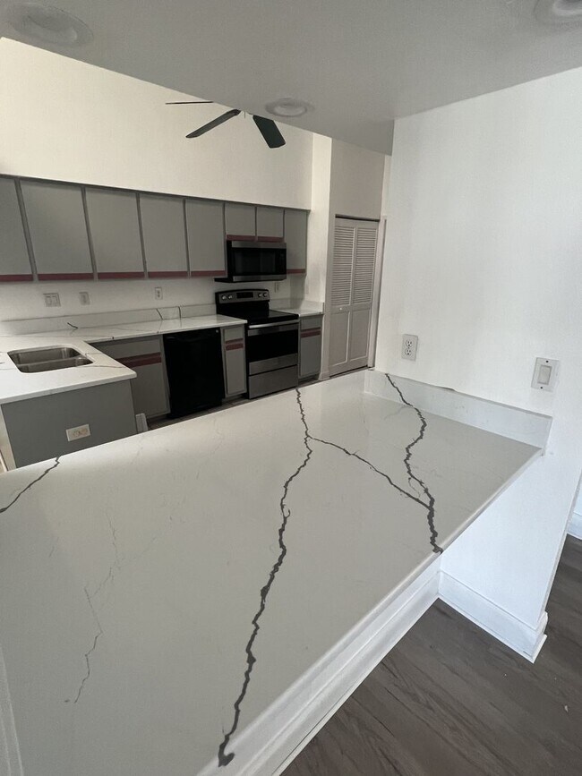 Building Photo - $1,875 ** ANNUAL ** Available 10/15/25 - Newly Renovated ** 3/2 Single Family Home with Oversized...