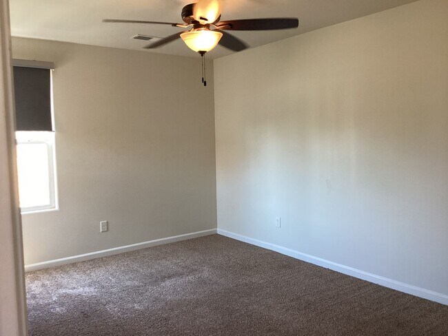 Building Photo - 7009 Harmony Dr