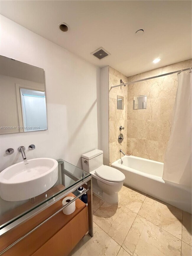 Building Photo - 6000 Collins Ave