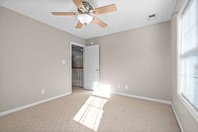 Building Photo - Pet Friendly Three Bedroom with Bonus!