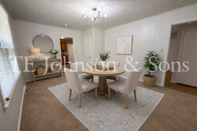 Building Photo - 3BR Home with Stainless Steel Appliances, Hardwood Floors & Carport