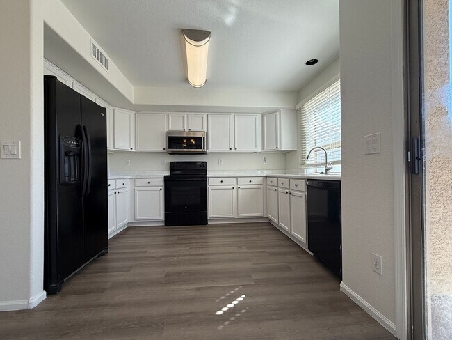 Building Photo - Johnson Ranch: 4 bedrooms, 2.5 bathrooms, ...