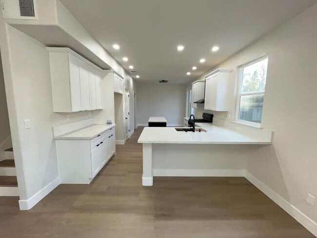 Building Photo - Fully Remodeled with Many Upgrades, A Must...