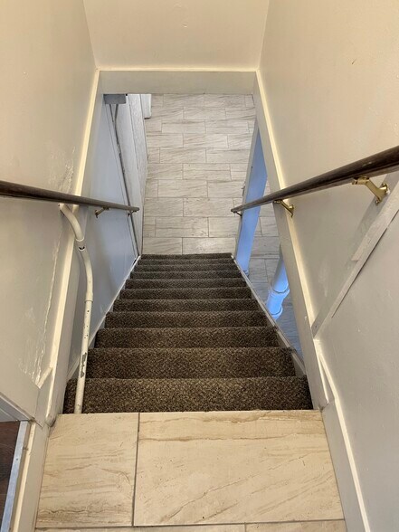 Steps to the basement - 1235 Ada Ave