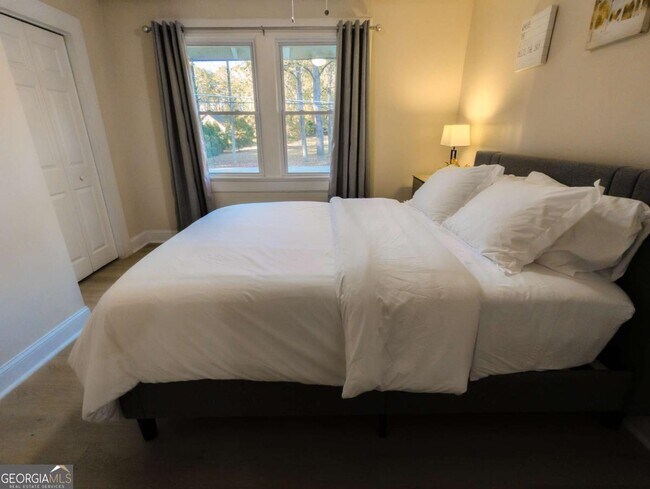 Building Photo - 6557 Woodrow Rd