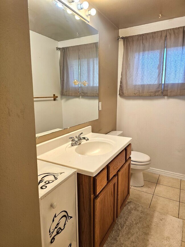 Building Photo - Ranch Style Home with 3 Bedrooms + 4th room/office, 2 Baths and RV parking!