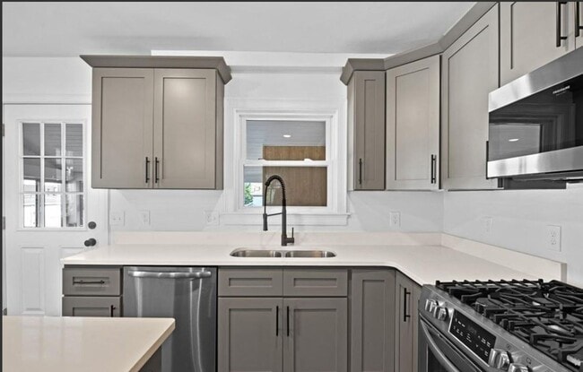 Building Photo - Spacious Condominium– Modern Comfort in th...