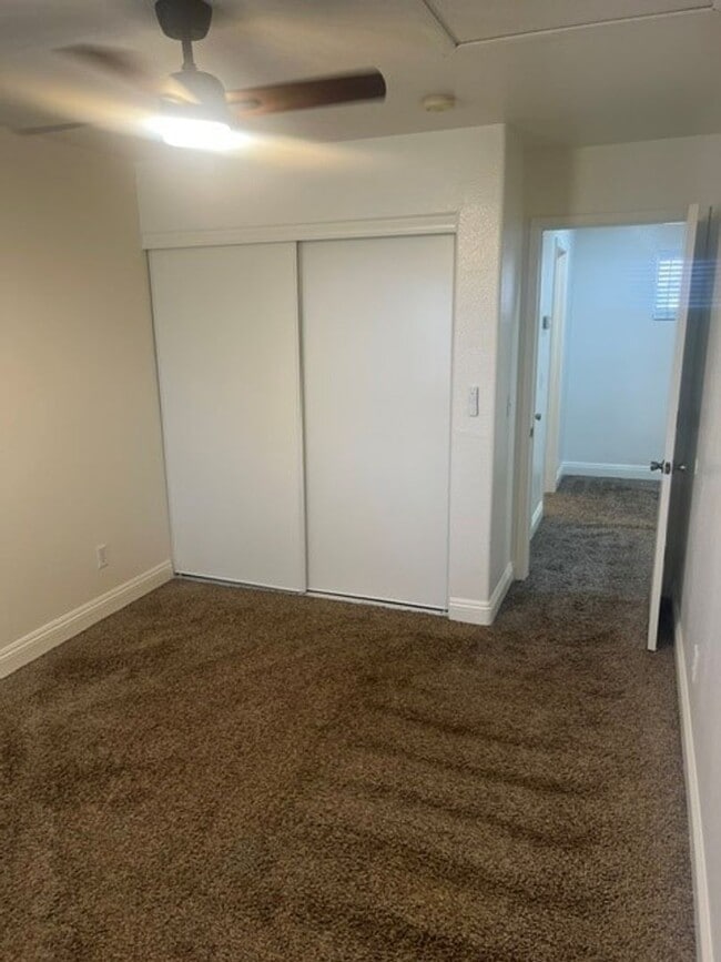 Building Photo - This three bedroom has the primary bedroom on the downstairs level.