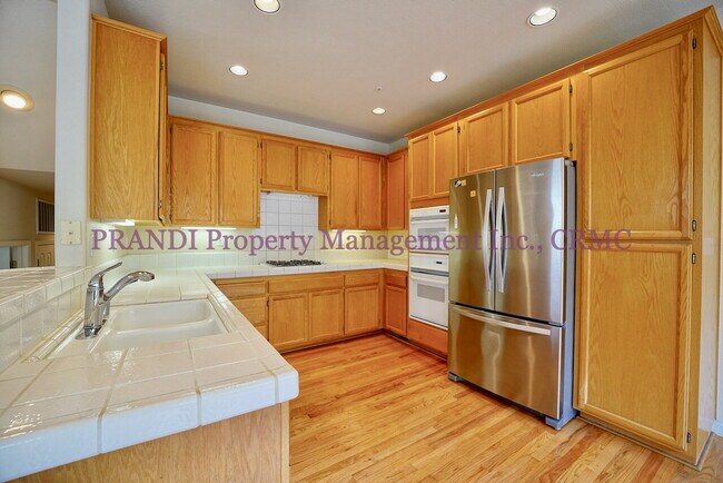 Building Photo - 5-BR Southern Novato Home With 3 Car Garage