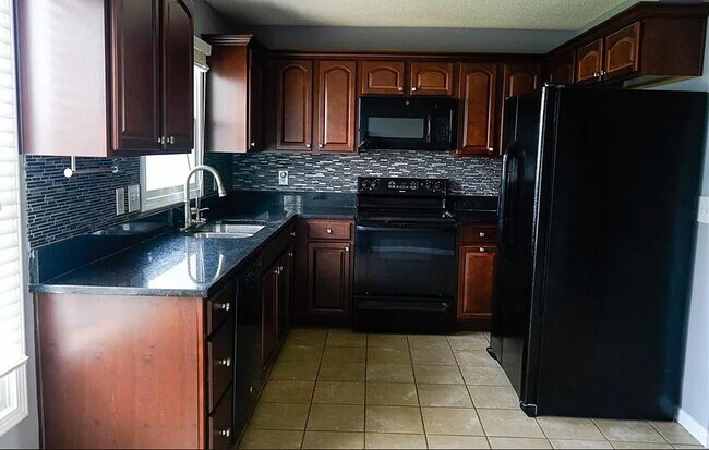 Building Photo - 853 E 167th Ct