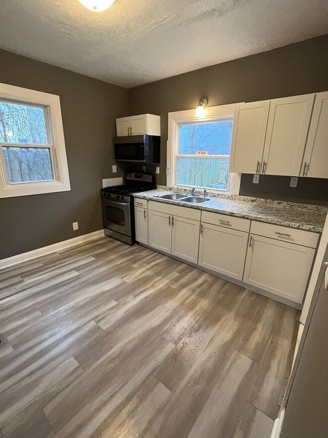 Building Photo - 239 Straight Ave SW