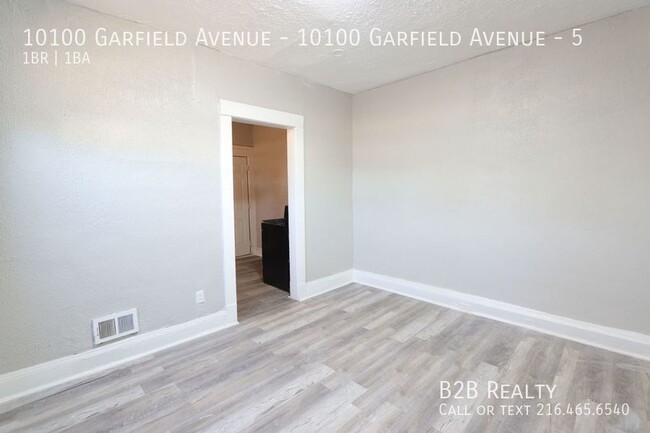 Building Photo - "Charming 1-Bedroom Oasis: Your Perfect Bl...