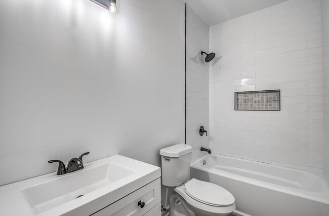Building Photo - Live Stylishly. Live Comfortably. Live Mem...