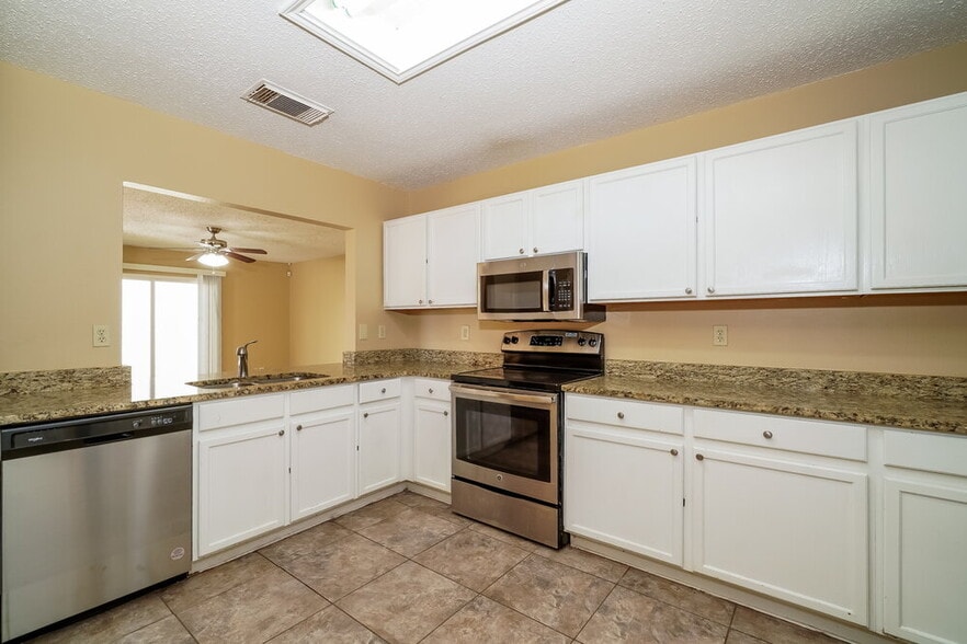 Building Photo - 6942 Saharastone Dr