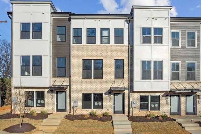Building Photo - High-End 2BR Townhome | Rooftop Terrace + 2-Car Garage | 24-Unit Community