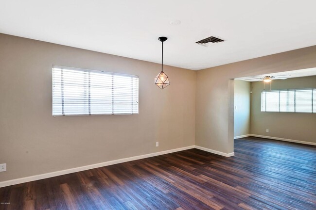 Building Photo - Remodeled property with lots of space and ...