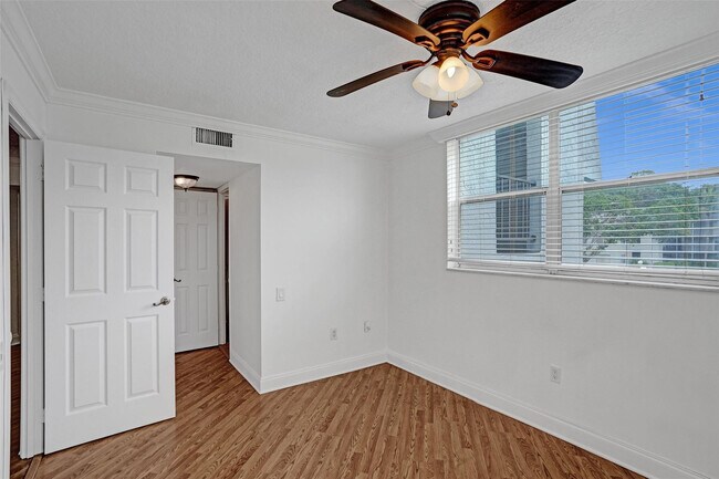 Building Photo - 9351 Lime Bay Blvd