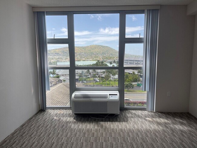 Building Photo - Come live with us at Hale Ka Lae! 2x2