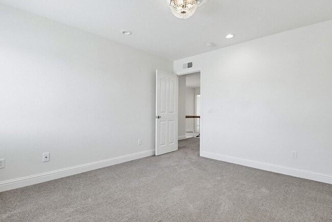 Building Photo - Stunning Upgraded 4BR Home with Pool in Desirable Rancho San Diego – Move-In Ready