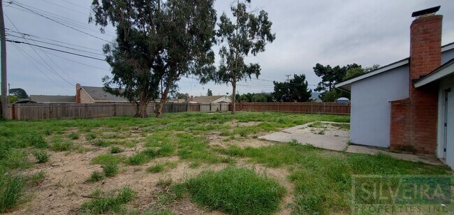 Building Photo - Four bedroom house available!