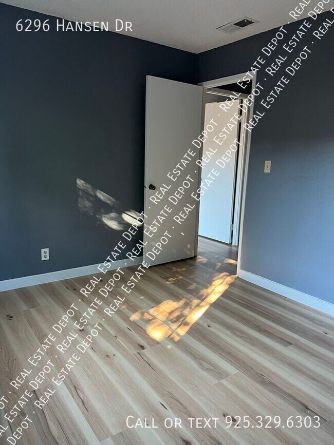 Building Photo - 6296 Hansen Dr