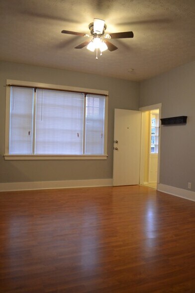 Living Room with Gorgeous Front Window! - 6148 Winthrop Ave