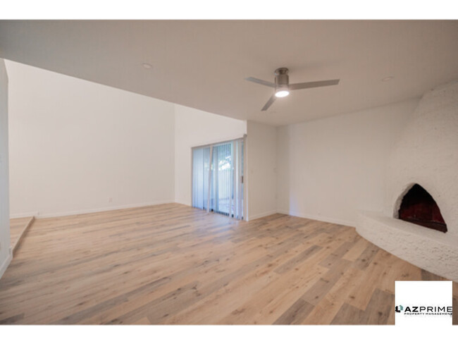 Building Photo - Live Large in This Captivating 2/2 Townhom...