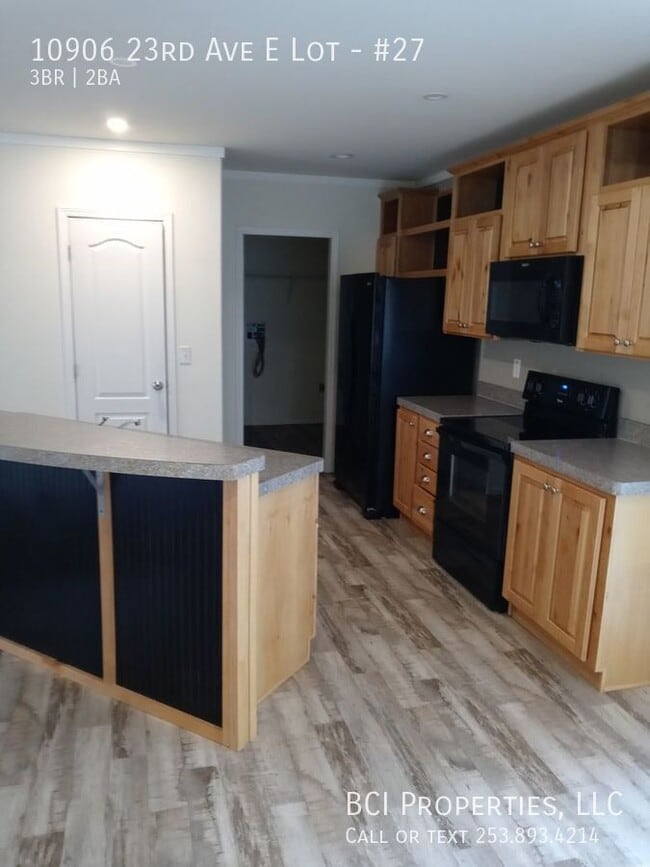 Building Photo - 10906 23rd Ave E