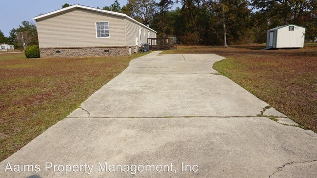 Building Photo - 4 br, 2.5 bath House - 7129 Hypony Trail