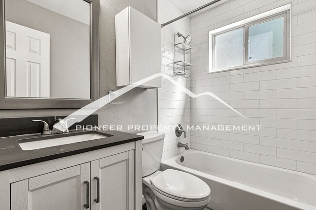 Building Photo - Spacious Half Duplex with Fenced Yard and Washer/Dryer