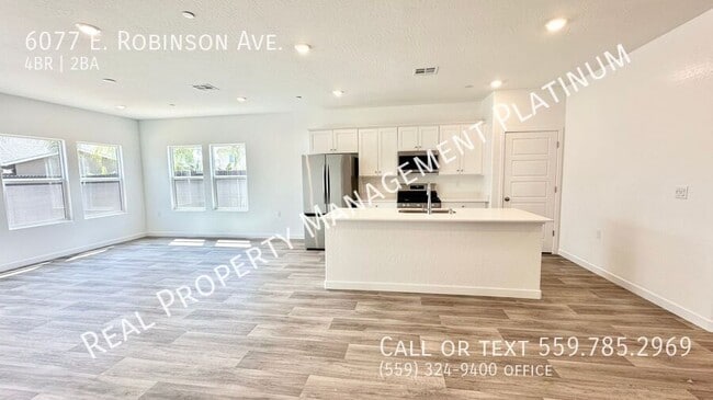 Building Photo - 6077 E Robinson Ave