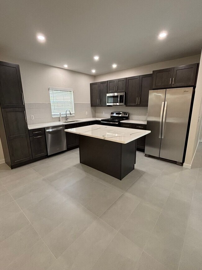 Building Photo - A MUST SEE THREE BEDROOM DUPLEX