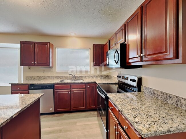 Building Photo - 6297 Satin Wood Dr