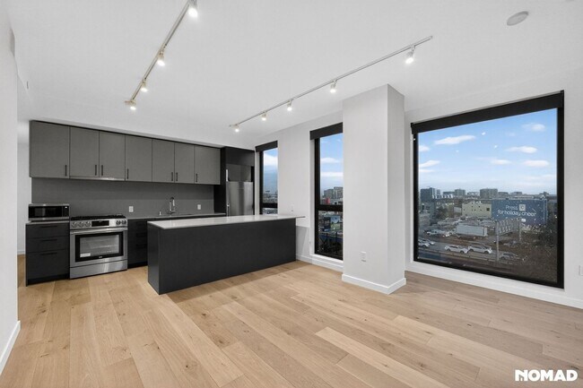 Building Photo - Act Fast: Luxury SoMa Corner Unit w/ EV Parking & Views