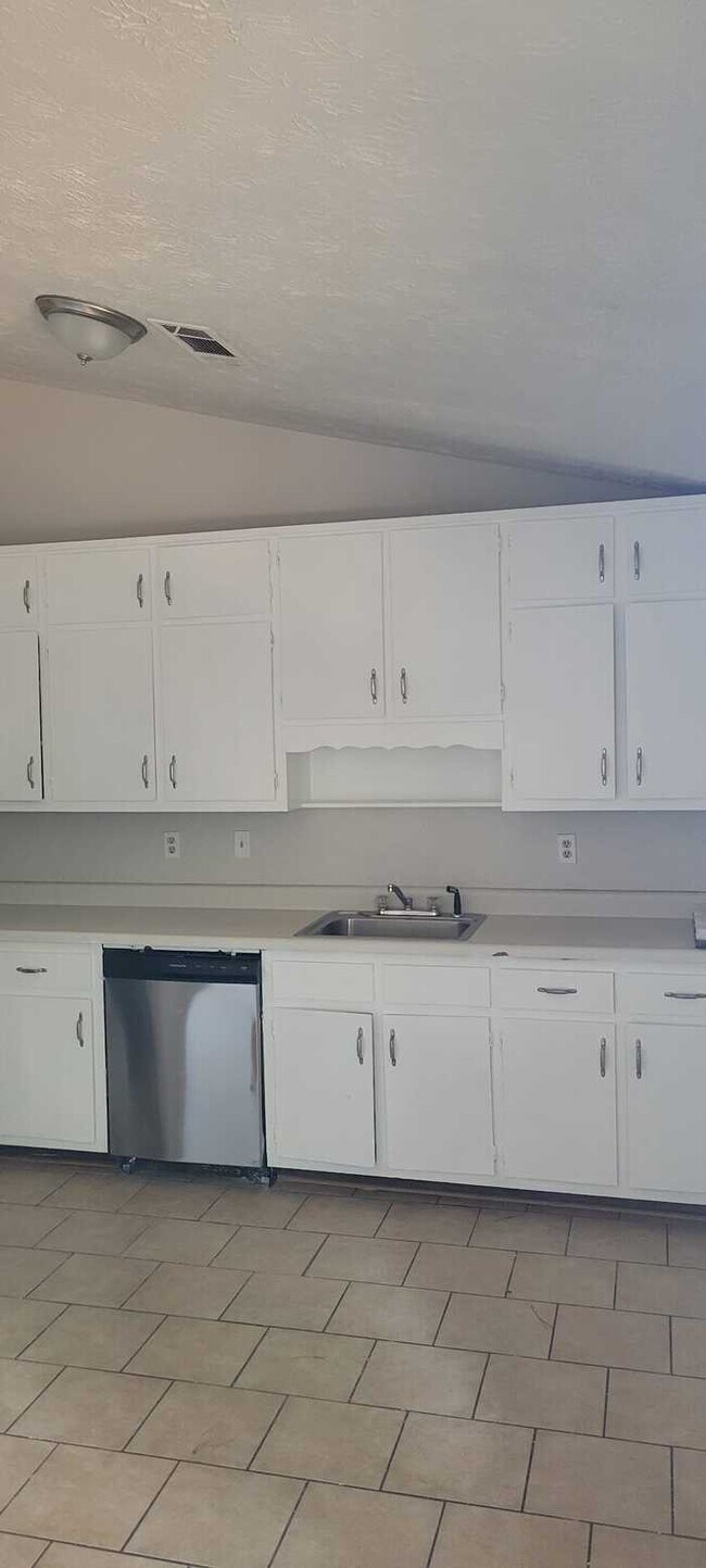 Building Photo - Three Bedroom Split Level Home/Unfinished ...