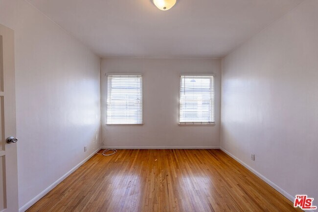 Building Photo - 8539 1/2 Cashio St