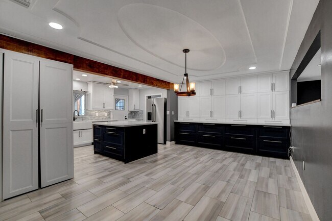 Building Photo - UNIQUE SINGLE FAMILY HOME! - No HOA, Car Lift, RV Parking and Nice Backyard