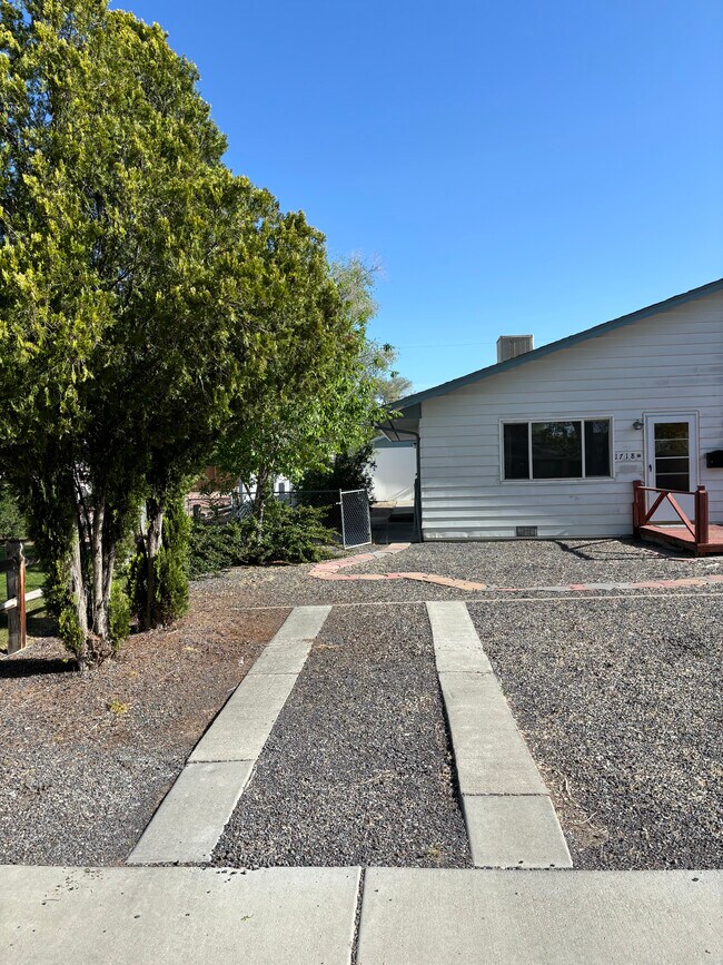 Xeriscaped front yard with parking space. New exterior paint and deck coming. - 1718 White Ave