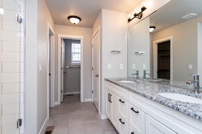 Building Photo - Spacious 5-Bedroom Home with Finished Base...