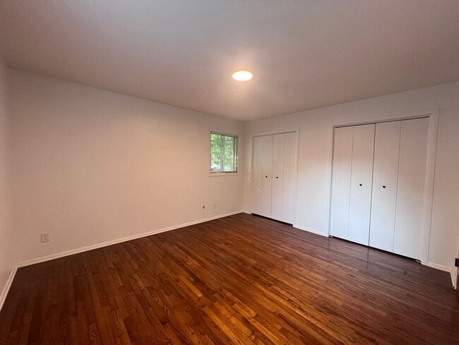 Building Photo - Two Bedroom Duplex SE Side w/ Decorative Fireplace! One Stall in Garage!