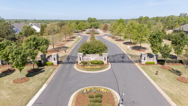 Building Photo - "Discover Spacious Living: 5-Bedroom Craftsman Home in Gated and Amenity-Rich Bretagne with Top-R...
