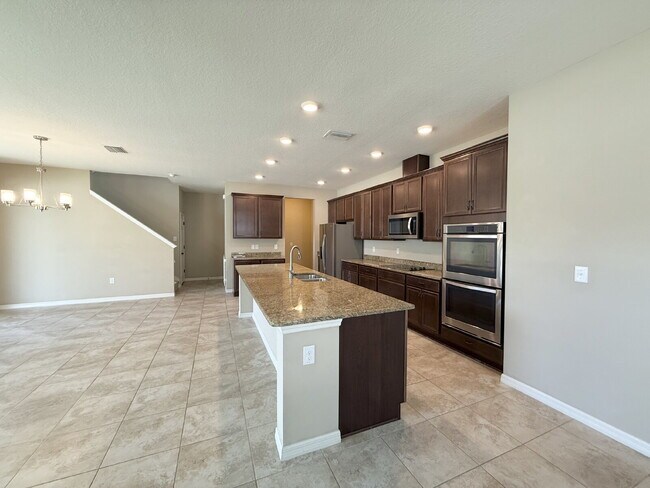 Building Photo - Spacious 4-Bedroom Retreat with additional office/den in the Heart of Trinity!