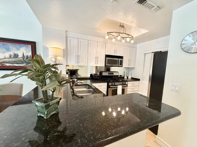 Building Photo - Meridian - Luxury STUDIO Condo w/ laminate Flooring. Pool View in Resort Style Community.