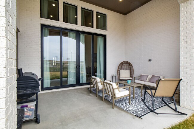 Building Photo - Stunning 4-Bedroom Luxury Residence with Bonus Office in the Prestigious Walsh Community LIKE NEW!