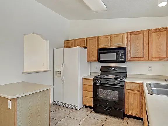 Building Photo - "Spacious 4-Bedroom Gem on Quartz Dr – Your Ideal Albuquerque Retreat!"