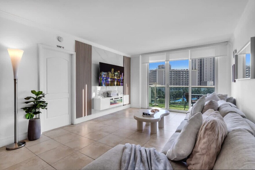 Building Photo - 19370 Collins Ave