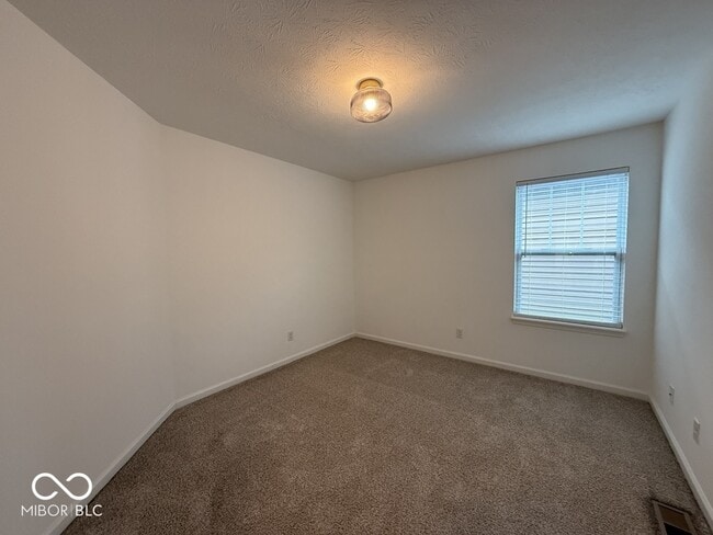 Building Photo - 326 N Warman Ave