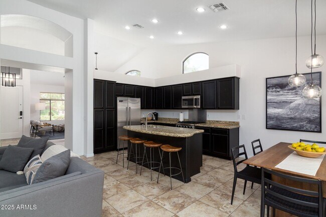 Building Photo - 6785 E Evans Dr
