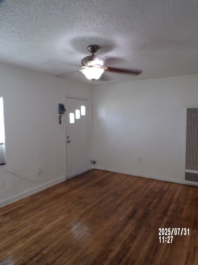 Building Photo - NEW listing-refinished hardwood floors, new laminate and paint throughout