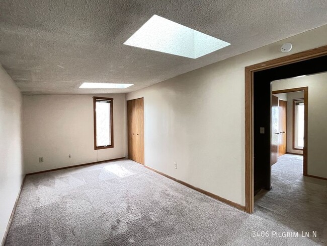Building Photo - 3406 Pilgrim Ln N